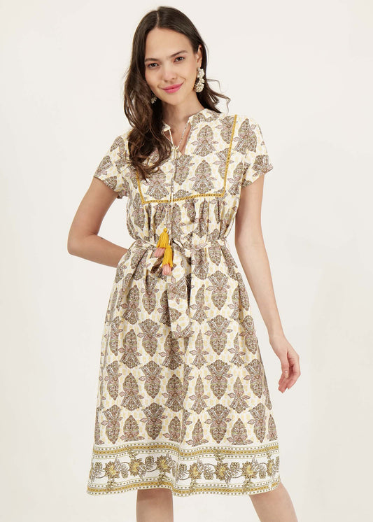 BORDER PRINT DRESS WITH TASSELS AT NECK